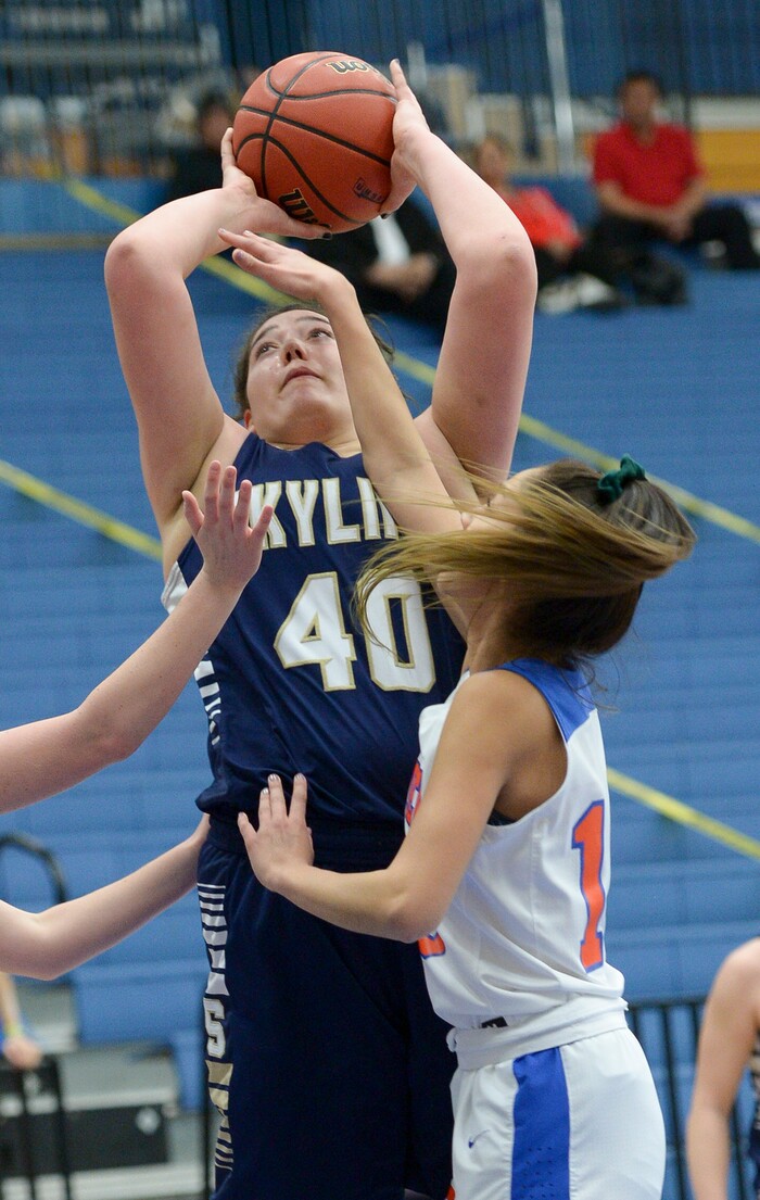 (Leah Hogsten  |  The Salt Lake Tribune) Skyline's Cameron Mooney (40) shoots past Timpview's defense. Timpview faces Skyline in their semifinal game of the 5A High School Girls' Basketball Tournament at SLCC in Taylorsville, Friday, Feb. 23, 2018. 