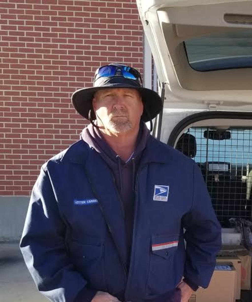 (Photo courtesy the National Association of Letter Carriers) In this photo, Price letter carrier Trent Hanna poses for a portrait. Hanna saved Jeff Hill's life on Oct. 19 while he was out delivering mail.