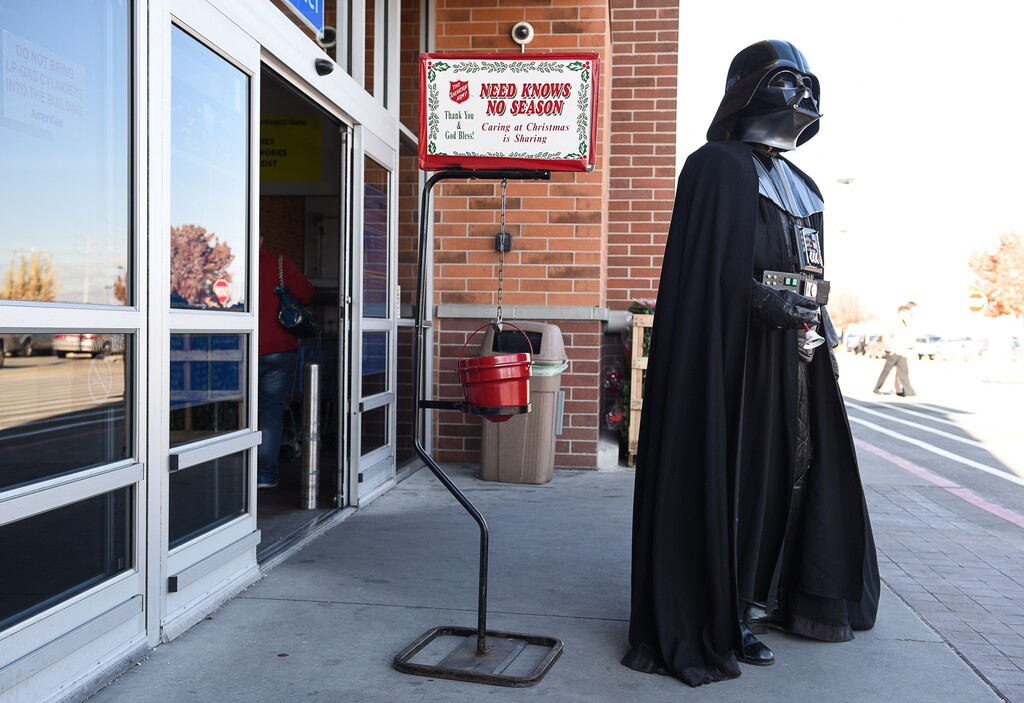 Francisco Kjolseth | The Salt Lake Tribune
Like so many others, Mark Fordham of Provo, UT, became a Star Wars fan after seeing the first movie back in 1977. Soon after he created his first crude Darth Vader costume. Since those days he has become a regular charitable contributor to events as a member of the 501st Legion costuming club. At the top of his list of favorites has always been ringing the bell for the Salvation Army, not only because of the cause but because of the interaction with other fans and the fact that he gets to stand out in the cold when wearing a costume that can get pretty hot.