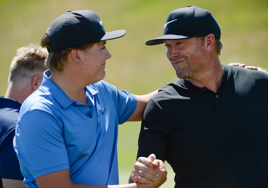 (Francisco Kjolseth  |  The Salt Lake Tribune)  Preston Summerhays, 16, embraces his dad Boyd Summerhays after thanking him for his support as he repeats as State Amateur golf champion at Soldier Hollow Golf Course on Saturday, July 13, 2019, beating Chase Lansford 7 and 6 in the final championship match.