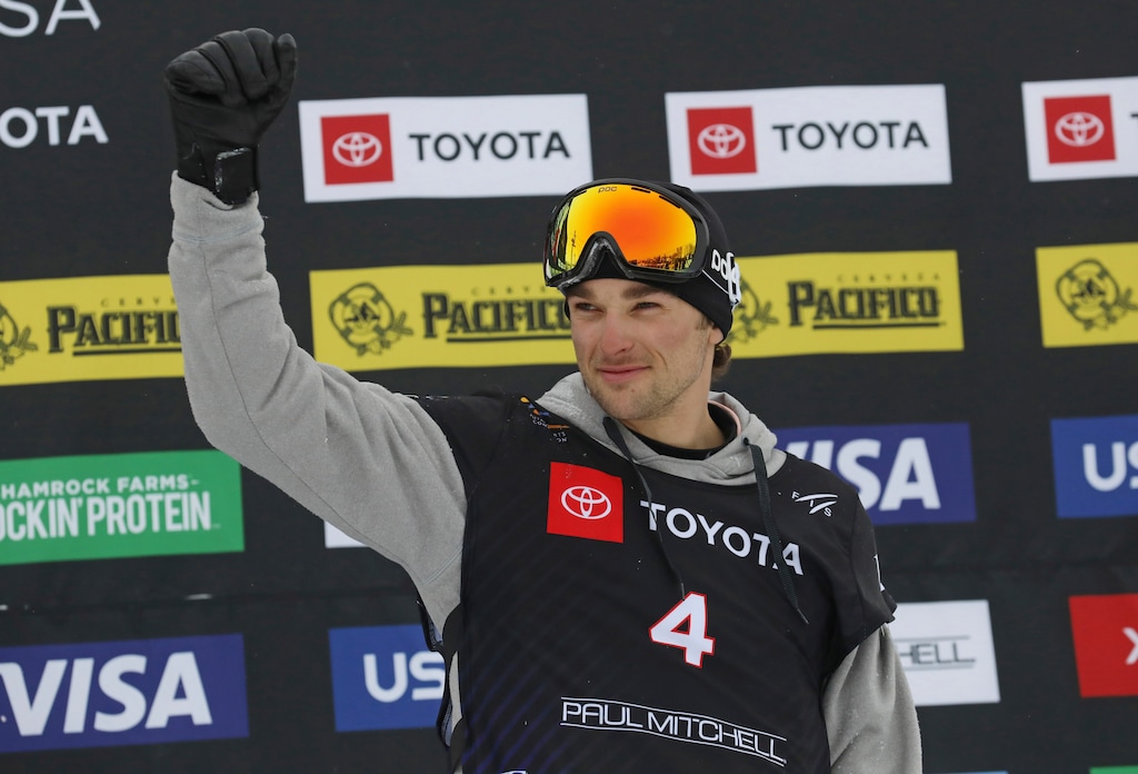 Third place finisher Nicholas Goepper, of the United States celebrates on the podium following the men's slopestyle skiing world championship Wednesday, Feb. 6, 2019, in Park City, Utah. (AP Photo/Rick Bowmer)