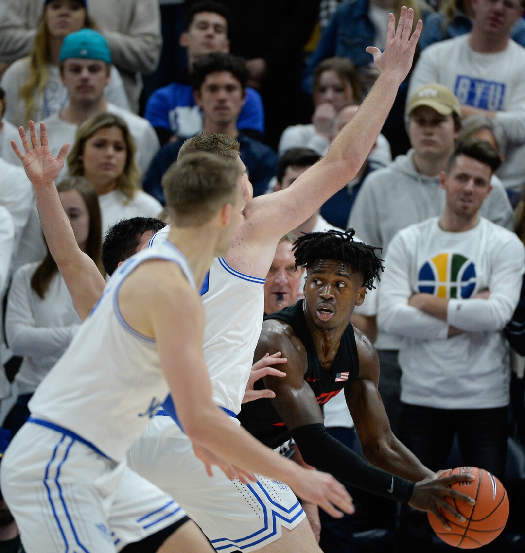 (Francisco Kjolseth  |  The Salt Lake Tribune)  UNLV Rebels forward Donnie Tillman (2) faces a defensive wall as BYU takes on UNLV in men's NCAA basketball at Vivint Smart Home Arena in Salt Lake City on Sat. Dec. 7, 2019.