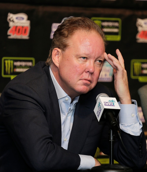 FILE - In this Nov. 19, 2017, file photo, Brian France, NASCAR Chairman, ponders a question during a news conference at Homestead-Miami Speedway in Homestead, Fla. NASCAR chairman Brian France has been arrested in New York's Hamptons for driving while intoxicated and criminal possession of oxycodone. France was arrested at 7:30 p.m. Sunday, Aug. 5, 2018, and held overnight. He was arraigned Monday at Sag Harbor Village Justice Court and released. (AP Photo/Terry Renna, File)