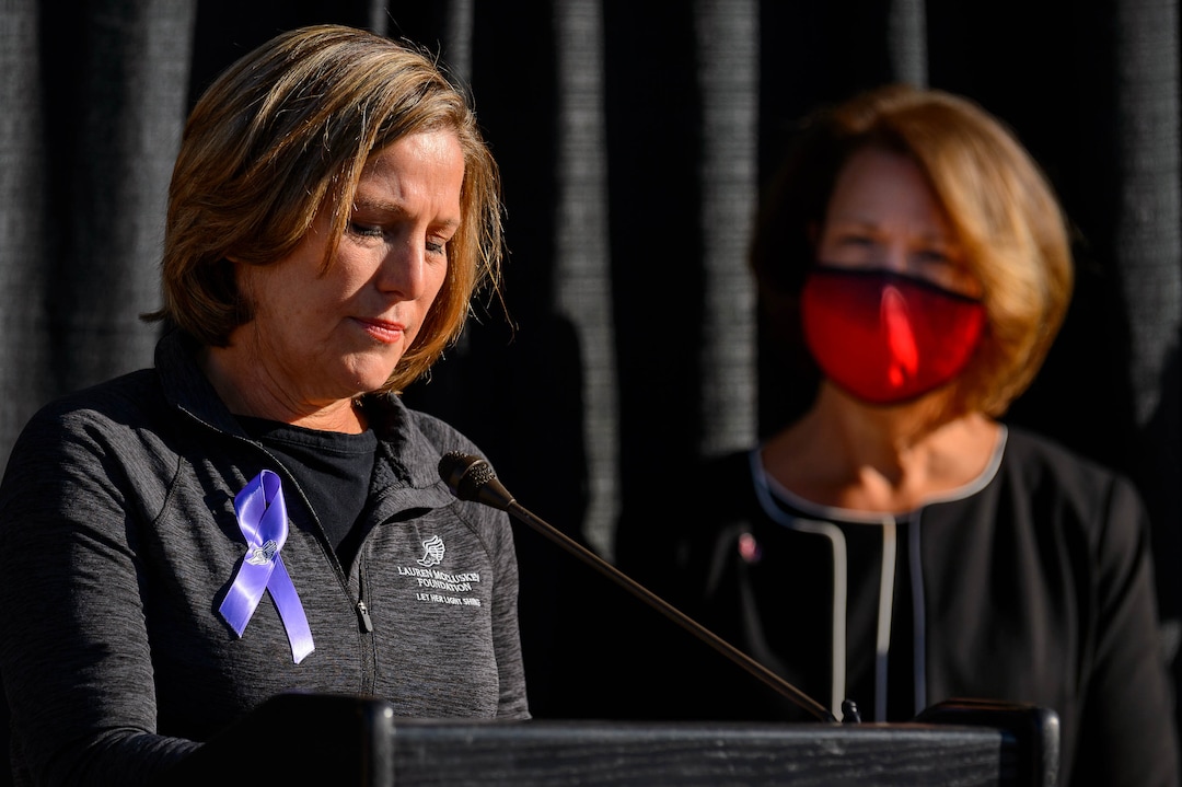(Trent Nelson  |  The Salt Lake Tribune) Jill McCluskey speaks as the family of Lauren McCluskey announces a settlement of their lawsuit against the University of Utah, in Salt Lake City on Thursday, Oct. 22, 2020. University of Utah President Ruth Watkins is at right.