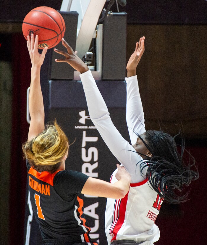 (Rick Egan  |  The Salt Lake Tribune)     Utah Utes forward Lola Pendande (12) blocks a shot by Oregon State Beavers guard Aleah Goodman (1), in PAC-12 basketball action between the Utah Utes and the Oregon State Beavers at the Jon M. Huntsman Center, Saturday, Feb. 1, 2020.