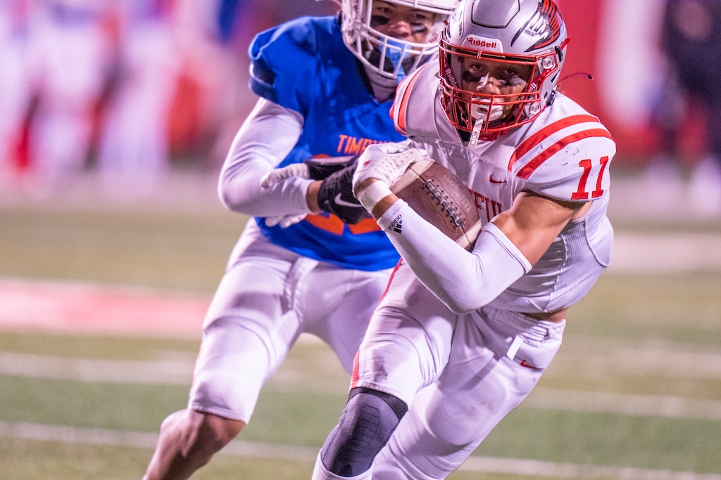 (Rick Egan | The Salt Lake Tribune)   Faletau Satuala runs for a Bountiful touchdown, in 5A State playoff action between the Timpview Thunderbirds and the Bountiful Redhawks, at Rice-Eccles Stadium, on Friday, Nov. 17, 2023.