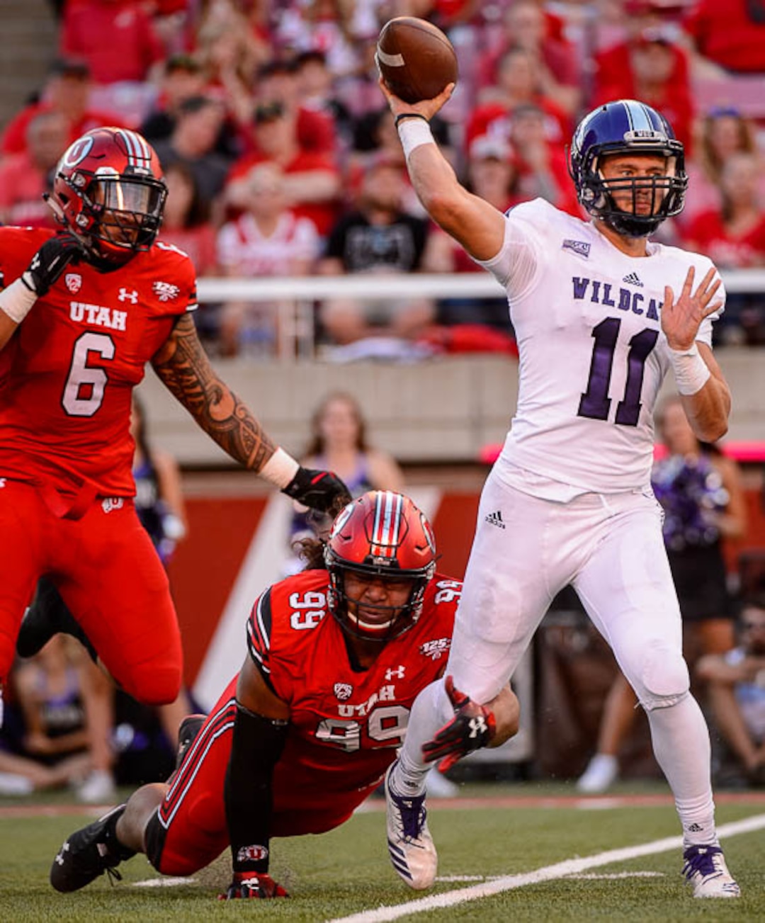 (Trent Nelson | The Salt Lake Tribune)  Weber State Wildcats quarterback Kaden Jenks (11) passes the ball as the University of Utah Utes host the Weber State Wildcats, Thursday Aug. 30, 2018 at Rice-Eccles Stadium in Salt Lake City.