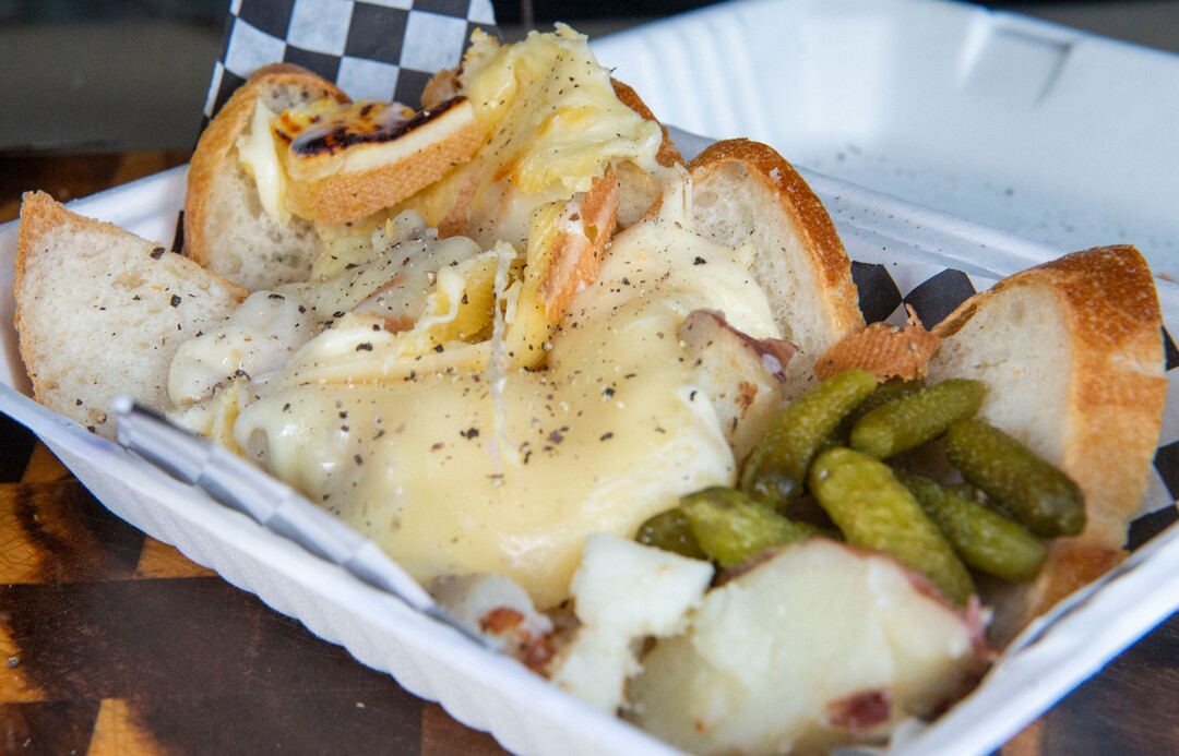 (Rick Egan  |  The Salt Lake Tribune)  "The Alpine," bread and vegetables with melted raclette cheese, in the Raclette Machine food truck, Wednesday, June 26, 2019. The food truck will be part of the Food Truck and Brewery Battle at The Gateway on Aug. 3.