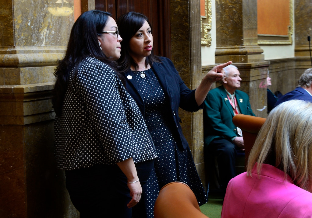 (Scott Sommerdorf   |  Tribune file photo) Rep. Angela Romero, right, speaks with Sen. Luz Escamilla, D-Salt Lake, on March 9, 2016. Romero and Escamilla are the House and Senate sponsors, respectively, a bill that raises Utah's minimum marriage age to 15.