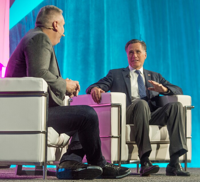 (Rick Egan  |  The Salt Lake Tribune)    Mitt Romney speaks with Alex Dunn, at the Tech Summit at the Salt Palace,  Friday, January 19, 2018.


