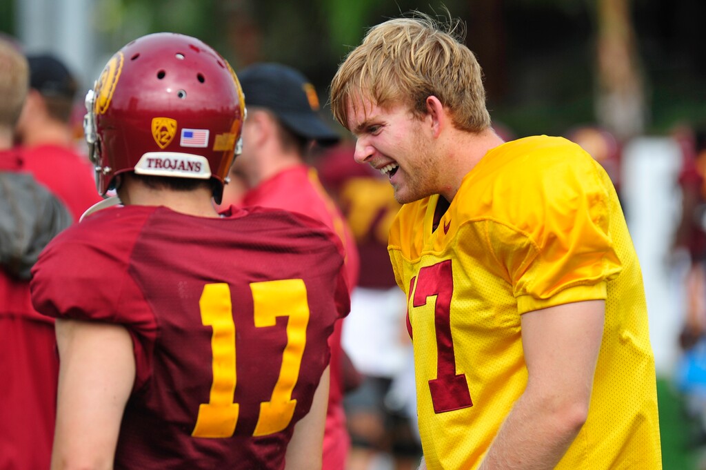 (USC photo) USC football player Jake Olson, right, jokes around with a teammate during practice.