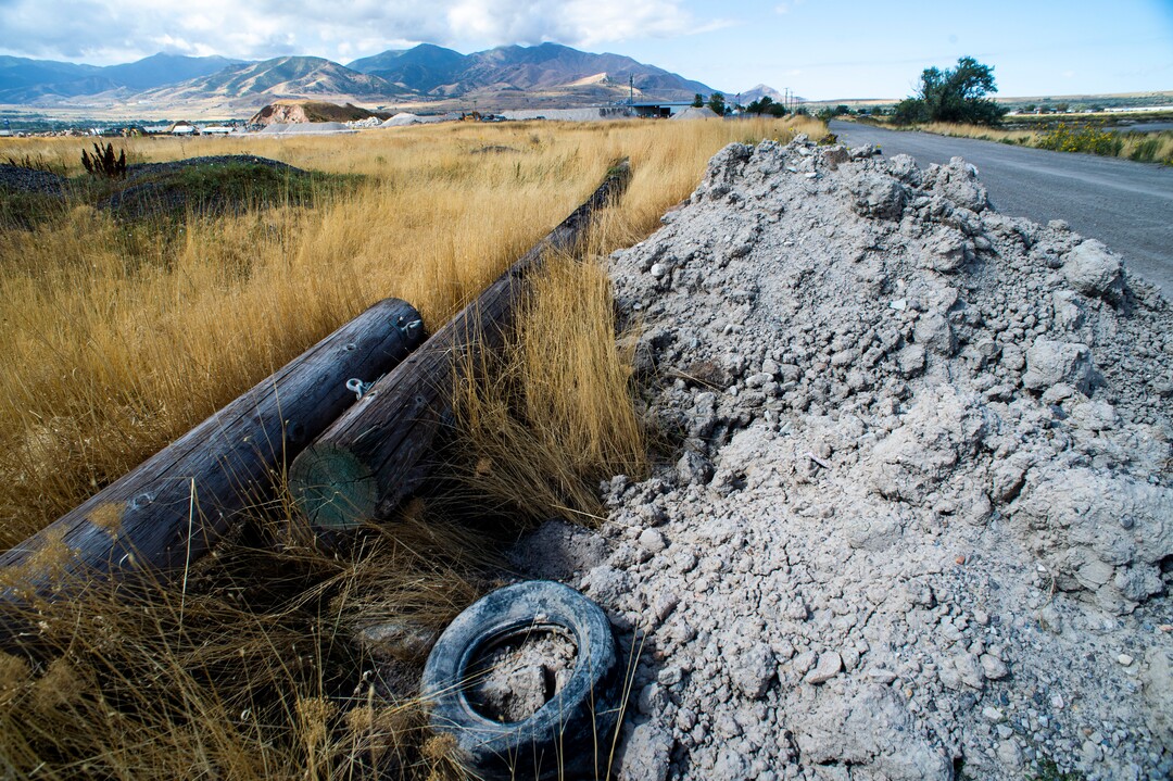 (Rick Egan  |  The Salt Lake Tribune)   Tires and garbage along 2100 South near 7200 West. The Salt Lake City Council is considering a temporary closure for a portion of road on 2100 South between 6500 West and 6900 West as a result of pervasive illegal dumping. Tuesday, Sept. 17, 2019.