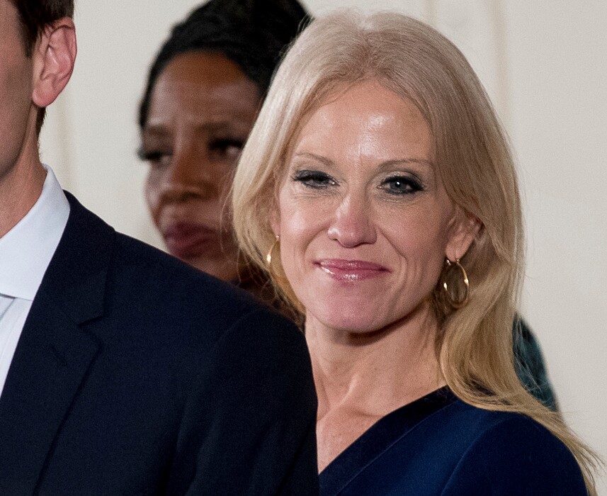 FILE - In this Sunday, Jan. 22, 2017 file photo, Counselor to the President Kellyanne Conway watches as President Donald Trump congratulates other White House senior staff during a swearing in ceremony in the East Room of the White House in Washington. A statement that day by Conway about White House press Secretary Sean Spicer providing "alternative facts," is included in the 2017 update to The Yale Book of Quotations. (AP Photo/Andrew Harnik, File)
