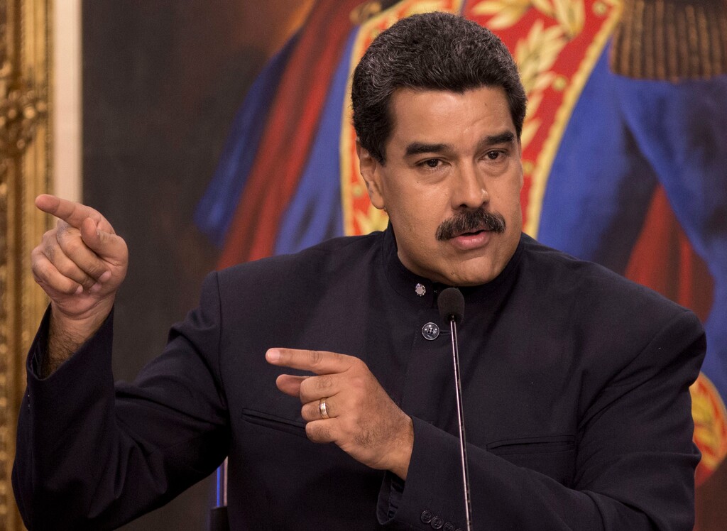 Venezuela's President Nicolas Maduro speaks at a news conference in Caracas, Venezuela, Tuesday, Aug. 22, 2017. Immigration authorities in Colombia announced that Venezuela's ousted chief prosecutor Luisa Ortega Diaz is on her way to Brazil. Ortega said that Maduro removed her in order to stop a probe linking him and his inner circle to nearly $100 million in bribes from Brazilian construction company Odebrecht. (AP Photo/Ariana Cubillos)