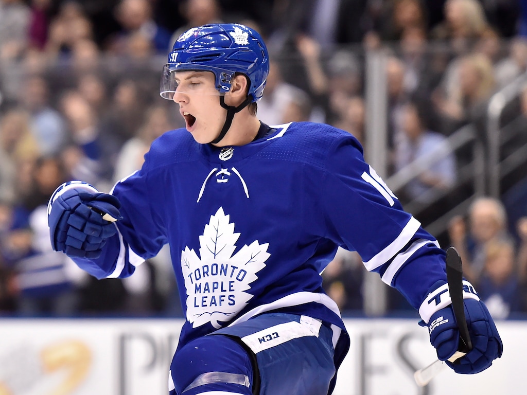 (Frank Gunn | The Canadian Press via AP) In this Jan. 31, 2018, file photo, Toronto Maple Leafs center Mitch Marner (16) celebrates his goal against the New York Islanders during the second period of an NHL hockey game in Toronto. 