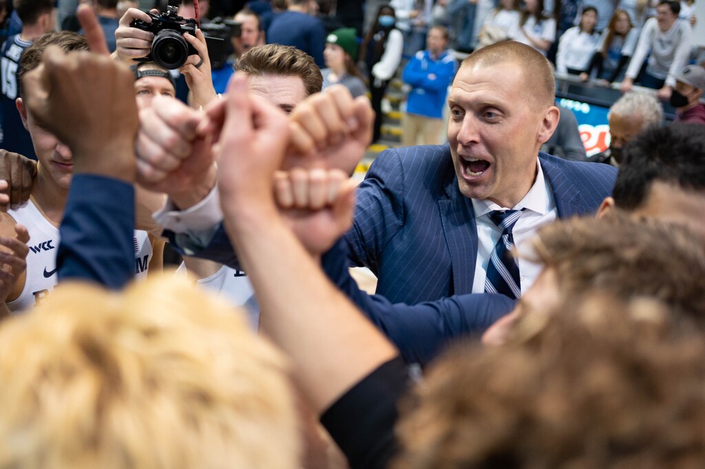 (Francisco Kjolseth | The Salt Lake Tribune) BYU basketball coach Mark Pope celebrates a 82-71 win over the Utah State Aggies at the Marriott Center in Provo, Wednesday, Dec. 8, 2021.