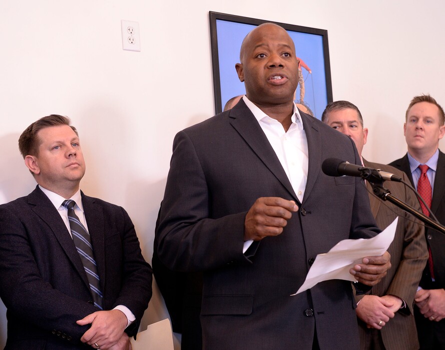 (Al Hartmann  |  The Salt Lake Tribune) 	
Maurice Egan, director of The Other Side Academy and members of the State Homeless Coordinating Committee meet in the Salt Lake City Police sub-station at 420 W. 200 S. to announce a third part of Operation Rio Grande,  "Dignity of Work" program to employ the homeless.  Steve Starks, president of Miller Sport Properties, (Utah Jazz), left, is spearheading the effort.