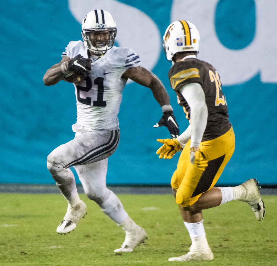 Rick Egan  |  The Salt Lake TribuneBrigham Young Cougars running back Jamaal Williams (21) ran for 210 yards as BYU defeated the Wyoming Cowboys, 24-21, in the Poinsettia Bowl, at Qualcomm Stadium in San Diego, December 21, 2016.
