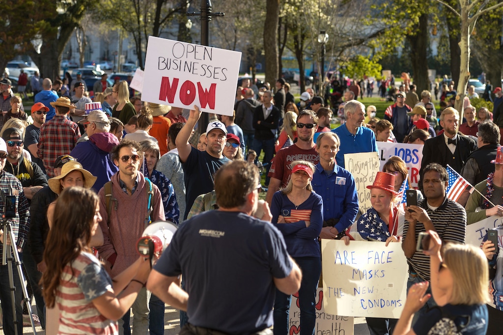 (Leah Hogsten  |  The Salt Lake Tribune)  About 1,000 people protested the government mandated shutdown of businesses on the grounds of Salt Lake City Hall, Saturday. The protest was organized by Utah Business Revival aimed at Mayor Erin Mendenhall, Salt Lake County Mayor Jenny Wilsonand Governor Gary Herbert policies on COVID-19 and social distancing, April 18, 2020.