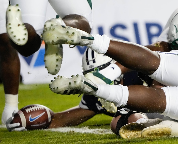 (Francisco Kjolseth | The Salt Lake Tribune) BYU tries to push past the defense for a touchdown in game action between the Brigham Young Cougars and the South Florida Bulls at LaVell Edwards Stadium in Provo, Saturday, Sept. 25, 2021.
