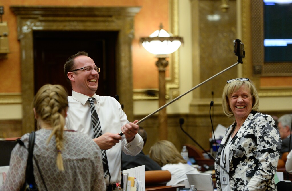 (Francisco Kjolseth | Tribune file photo) Rep. Justin Fawson, R-North Ogden, uses a selfie stick to document the conclusion of the legislative session on Thursday, March 10, 2016.