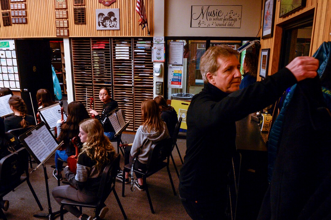 Leah Hogsten  |  The Salt Lake Tribune    Utah Symphony Music Director Thierry Fischer gets a glance after entering the practice session on Thursday. Fischer is helping members of the Cottonwood High School symphony bring to life Stravinsky's "The Firebirdâ" through the first Adopt a School pilot program. They will culminate in the performance of the piece on May 20, with Maestro Fischer conducting the live streamed event to other participating Utah orchestras who will be following along as the state's largest "Super Orchestra."