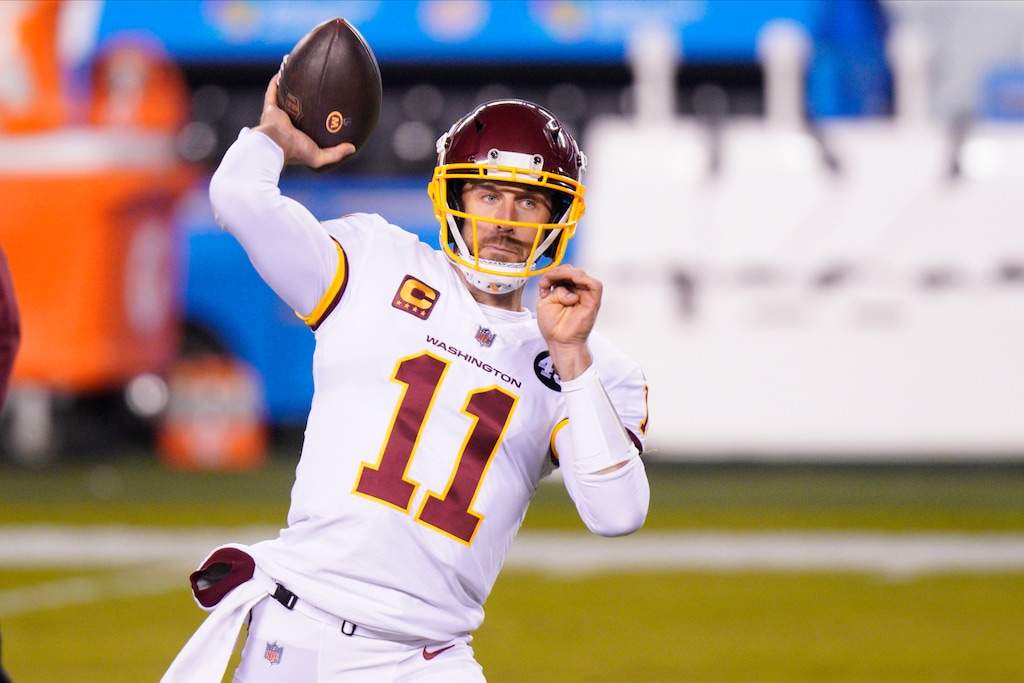 (AP File Photo) | Washington Football Team quarterback Alex Smith warms up before an NFL football game against the Philadelphia Eagles in Philadelphia, in this Sunday, Jan. 3, 2021, file photo. Smith, the former Utah great and No. 1 draft pick, announced his retirement on Monday.