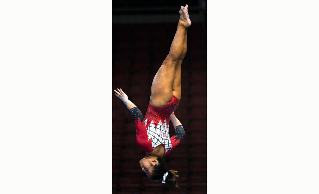 (Rick Egan | The Salt Lake Tribune) Cristal Isa competes on the bean for Utah in the PAC-12 Gymnastics Championship tournament at the Maverik Center, on Saturday, March 20, 2021.