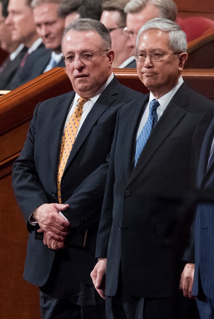 (Rick Egan  |  The Salt Lake Tribune)         Gerrit W. Gong and Ulisses Soares take their seats with the quorum of the 12 apostles, during the morning session of the 188th Annual General Conference in Salt Lake City,  Saturday, March 31, 2018.