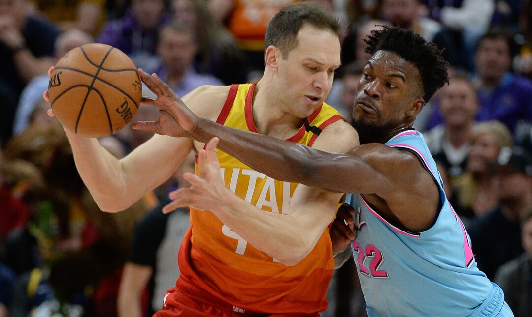 (Francisco Kjolseth  |  The Salt Lake Tribune) Miami Heat forward Jimmy Butler (22) tries to reach in for the ball on Utah Jazz forward Bojan Bogdanovic (44) as the Utah Jazz host the Miami Heat in their NBA basketball game at Vivint Smart Home Arena in Salt Lake City on Wednesday, Feb. 12, 2020.
