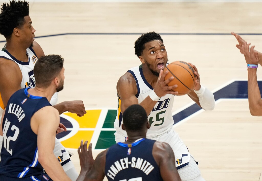 (Francisco Kjolseth | The Salt Lake Tribune) Utah Jazz guard Donovan Mitchell (45) makes an animated drive on the basket during Game 4 of an NBA basketball first-round playoff series, Saturday, April 23, 2022, in Salt Lake City.