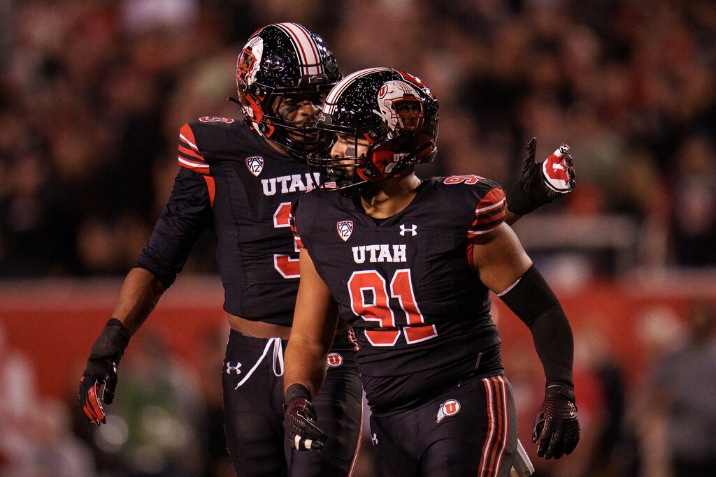 (Trent Nelson | The Salt Lake Tribune) Utah Utes defensive end Gabe Reid (91) celebrates a sack of USC Trojans quarterback Caleb Williams (13) as the University of Utah hosts USC, NCAA football in Salt Lake City on Saturday, Oct. 15, 2022.