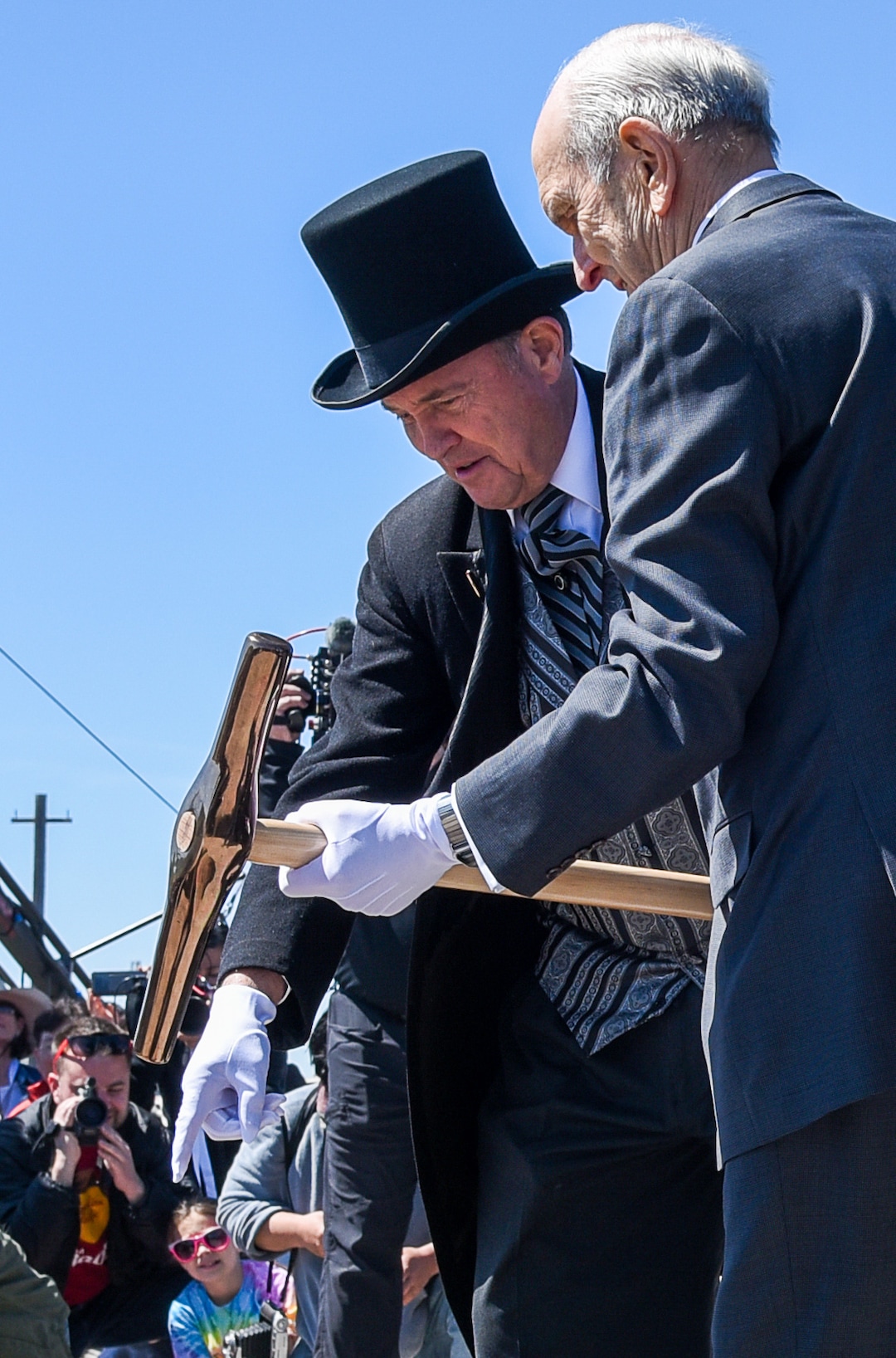 (Francisco Kjolseth  |  The Salt Lake Tribune)  Governor Gary Herbert directs Russell M. Nelson, President of The Church of Jesus Christ of Latter-day Saints in a symbolic strike of a final spike on Friday May 10, 2019, in celebration of the 150th anniversary of the completion of the transcontinental railroad at Promontory Summit where the two rails met back on May 10, 1869.