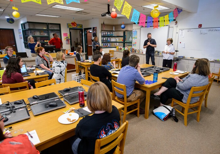 (Steve Griffin  |  The Salt Lake Tribune)  Franklin Elementary School special education teacher Jason Adam Tackett is surprised by Karen Huntsman, as she made the announcement  that he has won the Huntsman Award for Excellence in Education, during the school's faculty meeting in Salt Lake City Monday April 23, 2018. With the award comes a $10,000 cash prize.