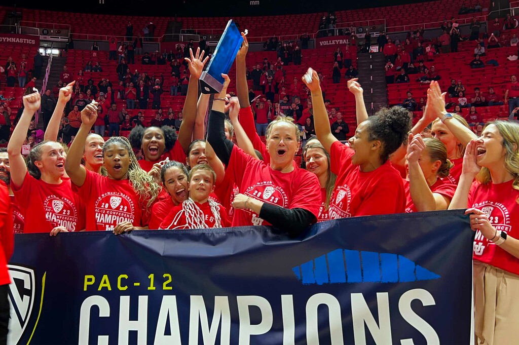 (Rick Egan | The Salt Lake Tribune) The Utes hold up the PAC-12 trophy, as they celebrate the Utes 84-78 win over the Stanford Cardinals, in PAC-12 action, at the Jon M. Huntsman Center, on Saturday, Feb. 25, 2023.
