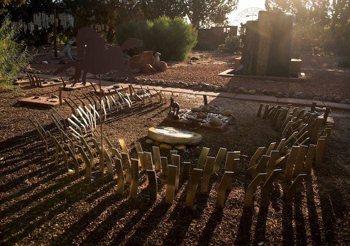 Leah Hogsten  |  The Salt Lake Tribune
Name placards in the shape of a horseshoe represents horses who have died. Every month, Best Friends holds a blessing ceremony to remember the animals who pass during the month.  Angels Rest is a three-acre cemetery for some 5,000 ÒplacementsÓ of dogs, cats, pigs, guinea pigs, birds and more features memorials of all kinds including wind chimes, painted rocks and personal effects. 
 Best Friends saves thousands of animals every year as the nation's largest no-kill sanctuary, encompassing some 3,700 acres about 5 miles outside Kanab.
