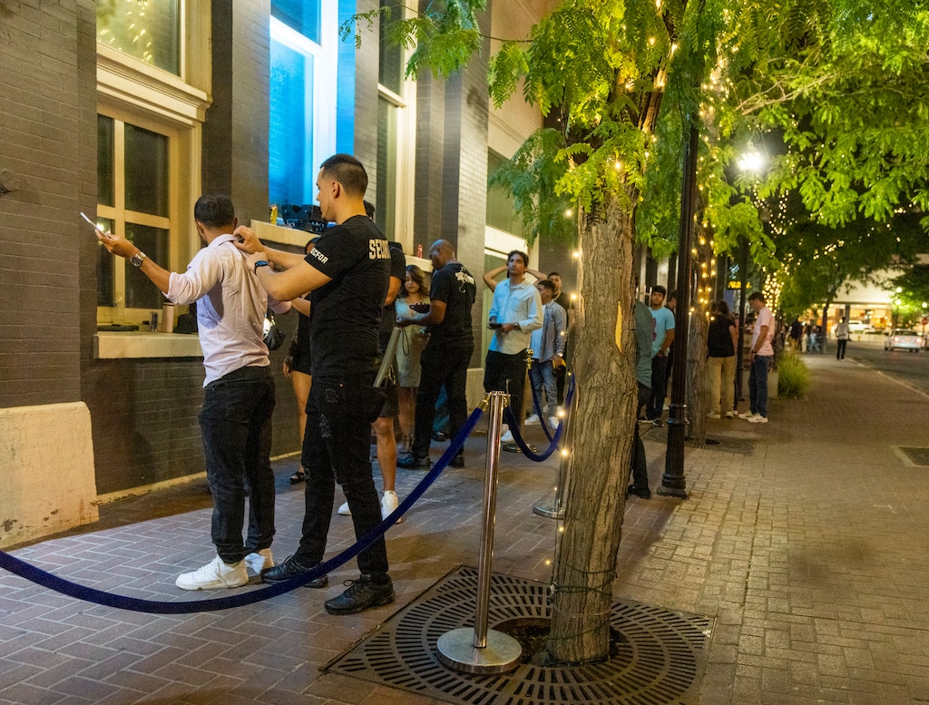 (Rick Egan | The Salt Lake Tribune) Security guards check patrons before entering Echo nightclub, on Pierpont Avenue, on Friday, July 22, 2022.