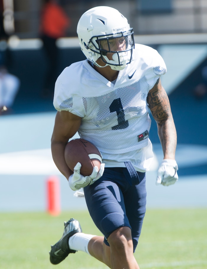 (Rick Egan  |  The Salt Lake Tribune) Defensiveback Troy Warner (1) runs with the ball after an intercepted pass, during the Cougars scrimmage at Lavell Edwards Stadium, Thursday, August 17, 2017.