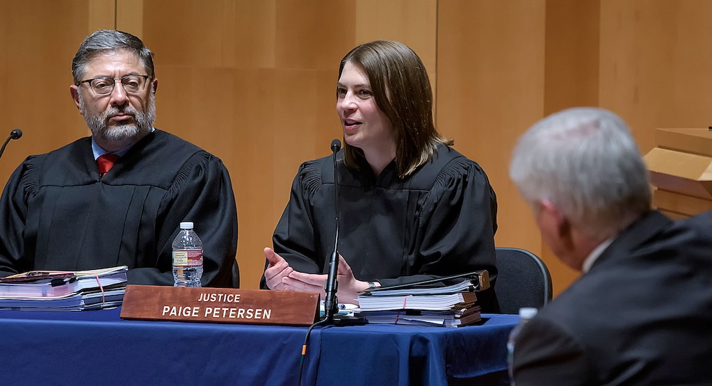 (Eli Lucero  |  Pool photo)  Justice Deno Himonas, left, listens as Justice Paige Petersen asks a question during the oral arguments of Teamsters v. Utah Transit Authority on Monday, March 19, 2018, in Logan. The Utah Supreme Court traveled to Utah State University to hear arguments in two cases followed by a Q&A with those in attendance.
