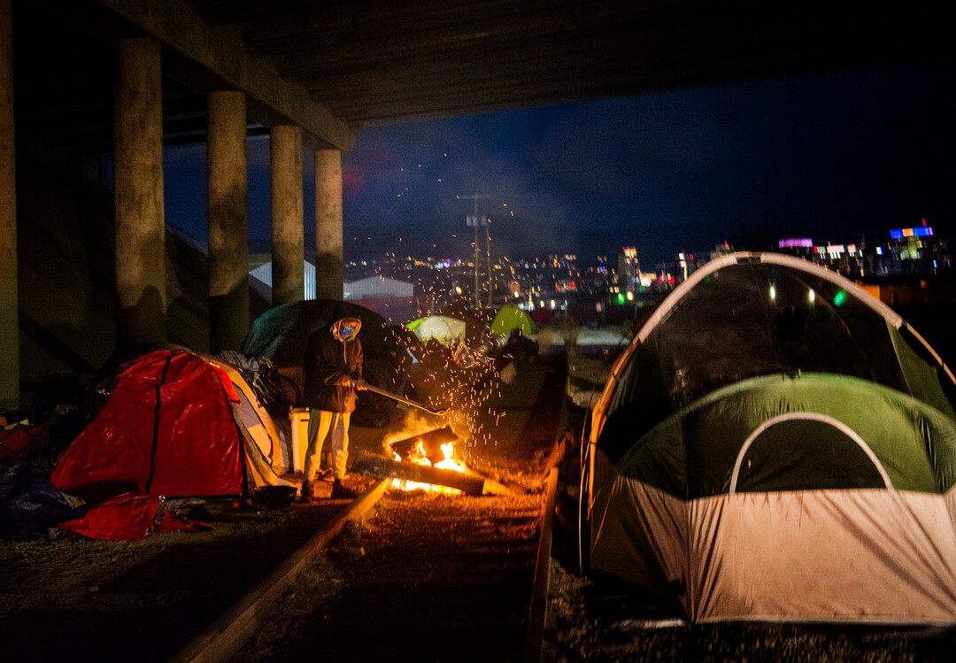(Rick Egan | The Salt Lake Tribune) Homeless seek shelter under the freeway after being moved from the Rio Grande area earlier this week, Saturday, Dec. 12, 2020.