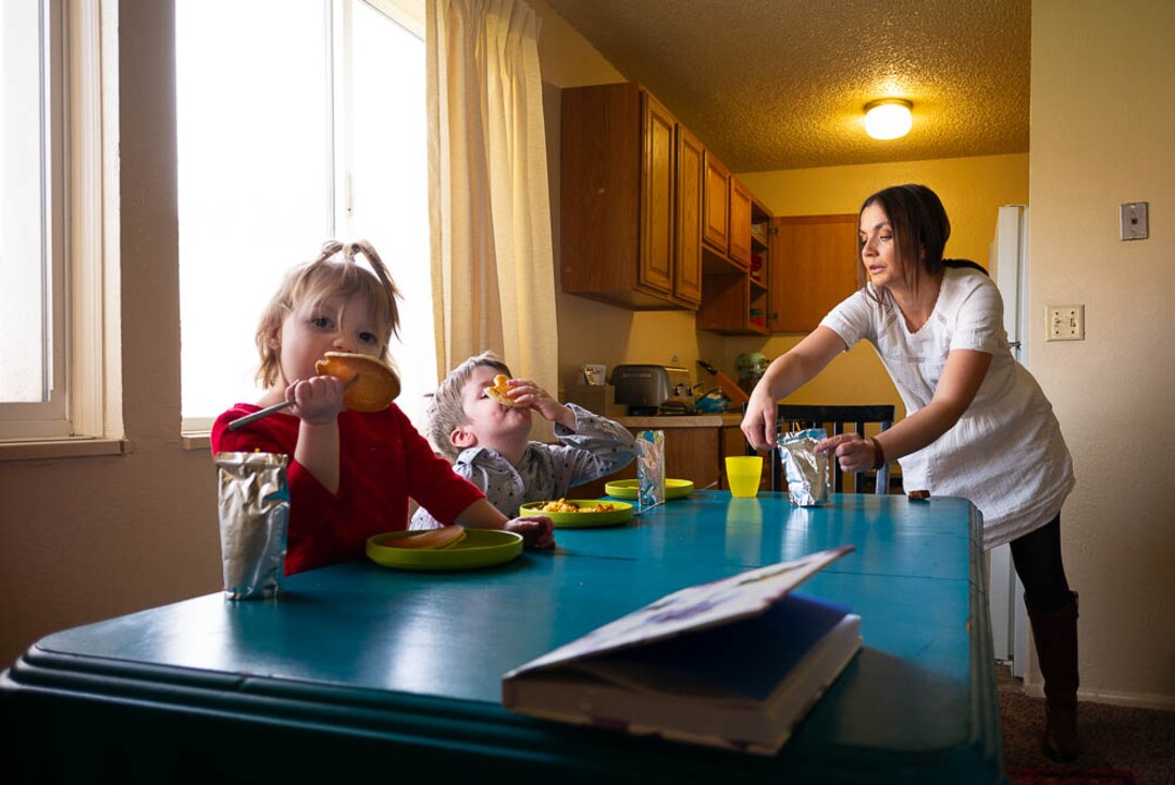 (Trent Nelson  |  The Salt Lake Tribune)  Michelle Densley serves pancakes to two of her children, Eva and Winston at her apartment in Salt Lake County on Monday April 8, 2019.