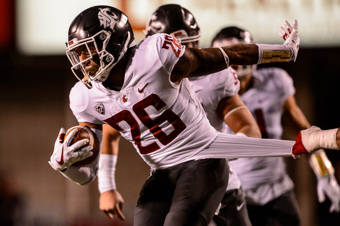 (Trent Nelson | The Salt Lake Tribune)  Washington State Cougars safety Hunter Dale (26) runs after an interception as the University of Utah hosts Washington State, NCAA football in Salt Lake City, Saturday November 11, 2017.