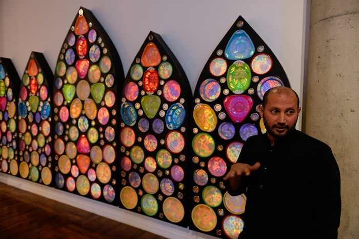 (Francisco Kjolseth | The Salt Lake Tribune) Rashed Al Shashai of Jeddah, Saudi Arabia discusses his his piece entitled "Heaven's Doors" made with plastic colanders and baskets infused with light. The Utah Museum of Contemporary Art is opening "Cities of Conviction," an exhibit of contemporary art by artists from Saudi Arabia.