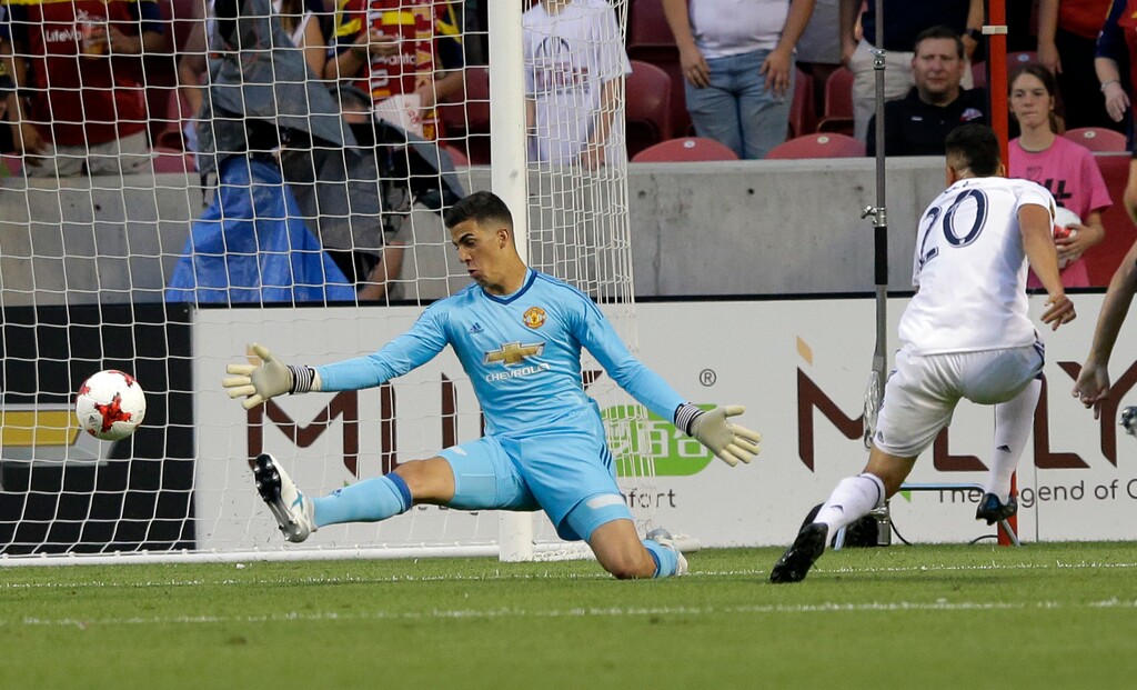 Real Salt Lake midfielder Luis Silva (20), soring against Manchester United goalkeeper Joel Castro Pereira in a friendly July 17, scored the game's only goal Sunday against D.C. United. (AP Photo/Rick Bowmer)