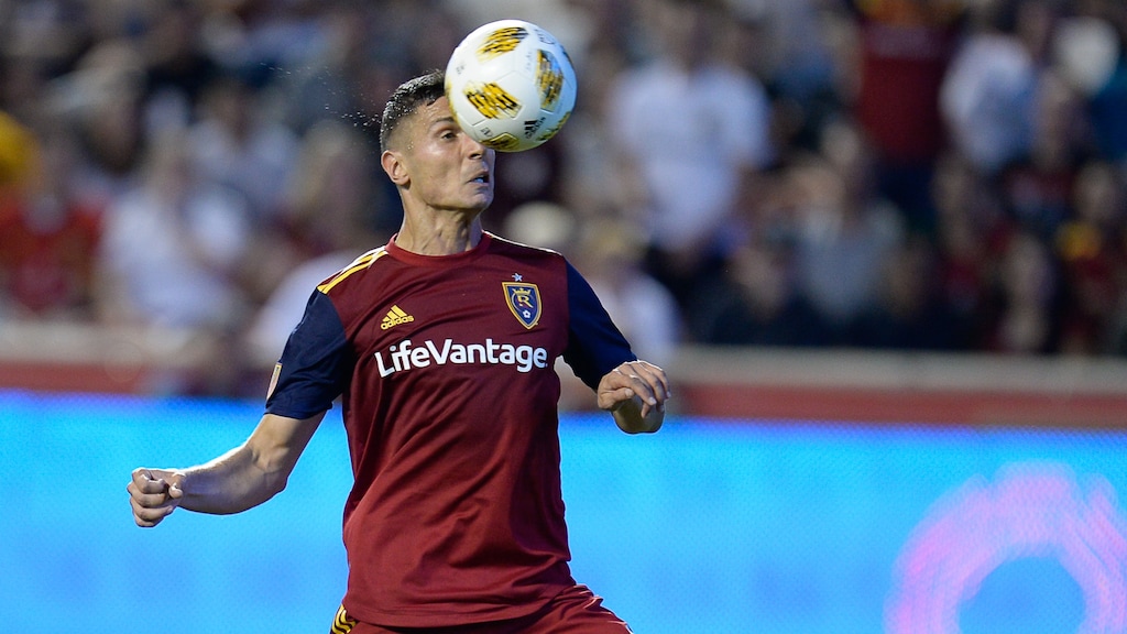 (Francisco Kjolseth | The Salt Lake Tribune) Real Salt Lake midfielder Damir Kreilach (6) gets the ball over Los Angeles Galaxy goalkeeper David Bingham (1) before heading it in for his first goal during the first half of the MLS soccer match Saturday, Sept. 1, 2018, in Sandy at Rio Tinto Stadium.