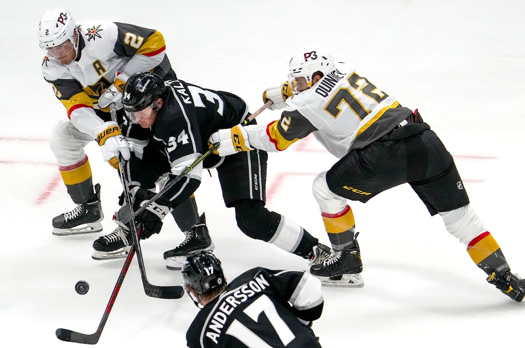 (Leah Hogsten | The Salt Lake Tribune)  Los Angeles Kings left wing Arthur Kaliyev (34) battles Vegas Golden Knights defenseman Zach Whitecloud (2) and Vegas Golden Knights center Gage Quinney (72) as the Los Angeles Kings and Vegas Knights meet in a preseason game at Vivint Arena on Sept. 30, 2021.