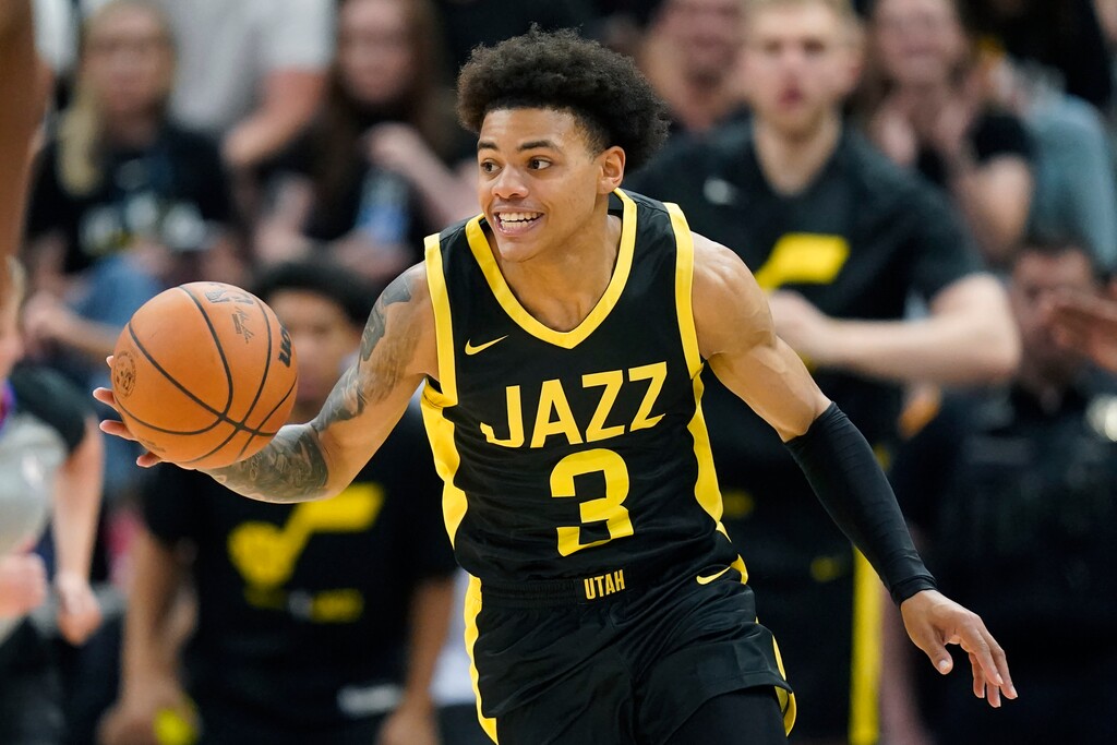 Utah Jazz guard Keyonte George brings the ball upcourt in the second half during an NBA Summer League basketball game against the Oklahoma City Thunder, Monday, July 3, 2023, in Salt Lake City. (AP Photo/Rick Bowmer)
