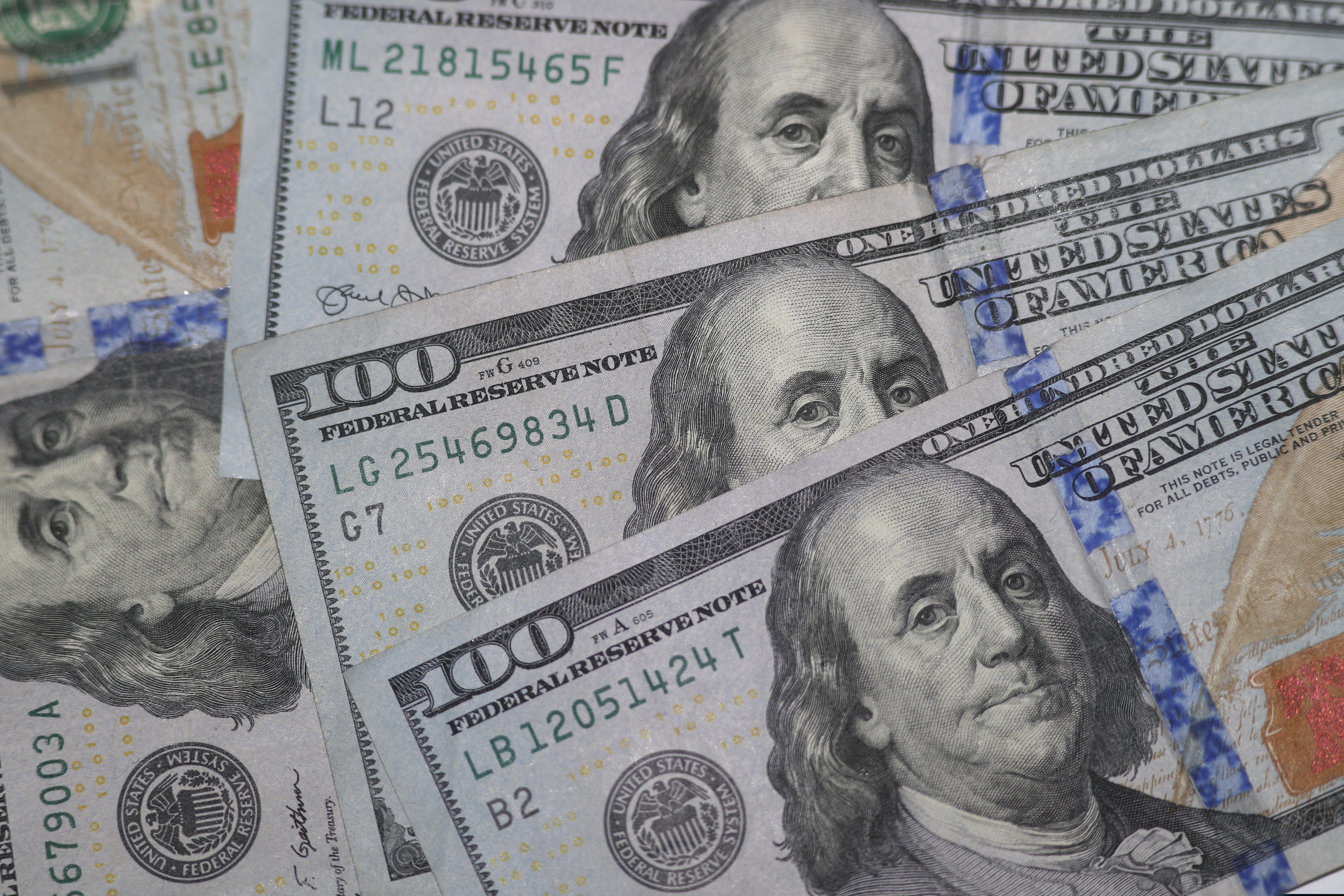 FILE - This Jan. 22, 2020, file photo shows $100 bills in Dallas. (AP Photo/LM Otero, File)