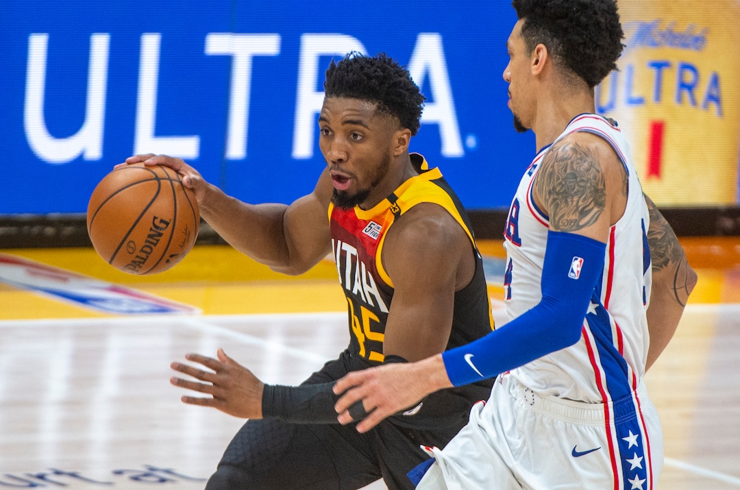 (Rick Egan | The Salt Lake Tribune) Utah Jazz guard Donovan Mitchell (45) looks for a shot as Philadelphia 76ers forward Danny Green (14) defends, in NBA action between the Utah Jazz and the Philadelphia 76ers at Vivint Arena, on Monday, Feb. 15, 2021.