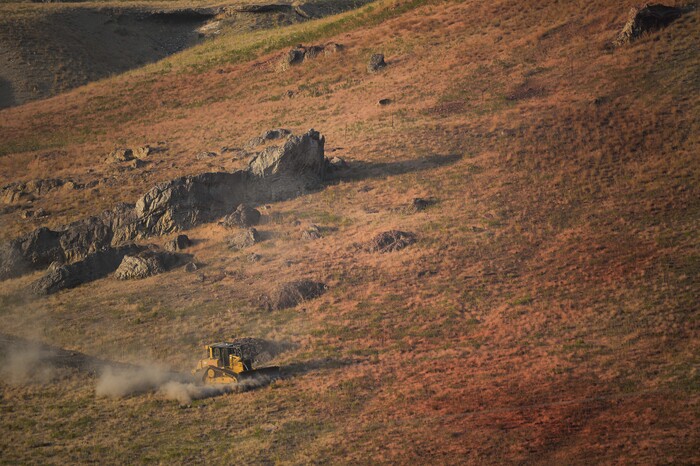 (Francisco Kjolseth  |  The Salt Lake Tribune)  Crews battle a grass fire in Tooele county being dubbed the Green Ravine fire as it burns on Tuesday, Sept. 3, 2019.